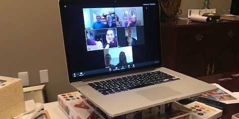 Computer with Zoom conference call on screen